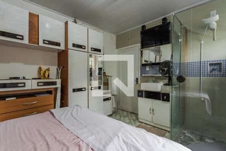 Quarto com banheiro de casa à venda com 4 quartos, 200m² em Bom Jesus, Porto Alegre