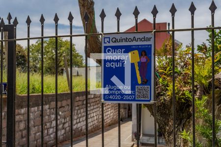 Fachada e placa de casa à venda com 4 quartos, 200m² em Bom Jesus, Porto Alegre
