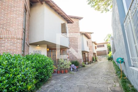 Fachada de casa de condomínio à venda com 3 quartos, 166m² em Jardim Isabel, Porto Alegre