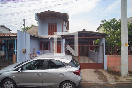 Fachada e placa de casa à venda com 3 quartos, 150m² em Santo Afonso, Novo Hamburgo