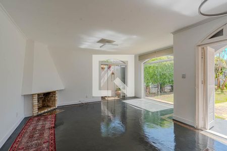 Sala de casa à venda com 3 quartos, 160m² em Guarujá, Porto Alegre