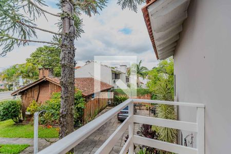 Varanda de casa à venda com 4 quartos, 300m² em Vila Nova, Porto Alegre