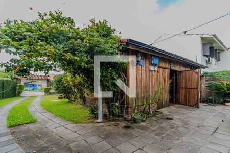 Área externa de casa à venda com 4 quartos, 300m² em Vila Nova, Porto Alegre