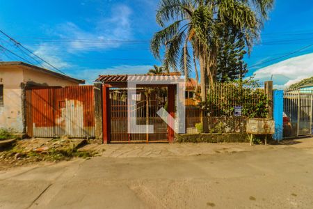 Fachada principal e placa de casa à venda com 2 quartos, 175m² em Morro Santana, Porto Alegre