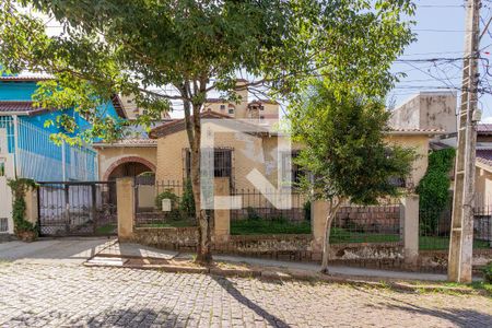 Fachada de casa à venda com 3 quartos, 110m² em Teresópolis, Porto Alegre