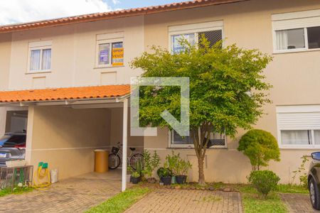 Fachada de casa de condomínio à venda com 3 quartos, 109m² em Fátima, Canoas