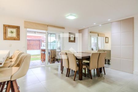 Sala de casa de condomínio à venda com 3 quartos, 196m² em Vila Nova, Porto Alegre