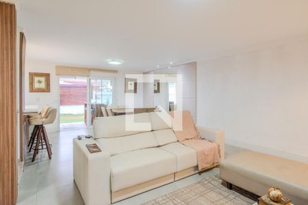 Sala de casa de condomínio à venda com 3 quartos, 196m² em Vila Nova, Porto Alegre