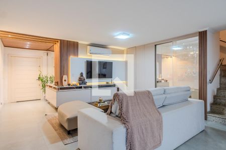 Sala de casa de condomínio à venda com 3 quartos, 196m² em Vila Nova, Porto Alegre