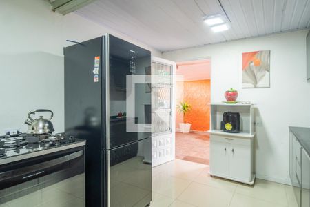Cozinha de casa à venda com 3 quartos, 300m² em Vila Nova, Porto Alegre