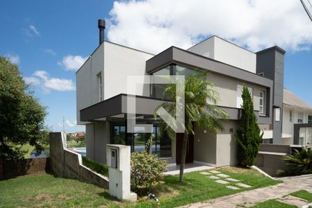 Fachada de casa de condomínio à venda com 3 quartos, 335m² em Hípica, Porto Alegre