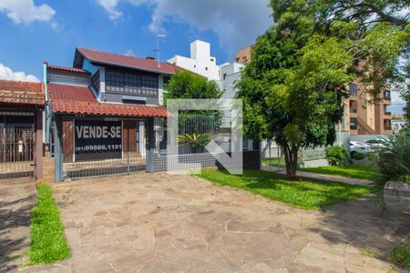 Fachada de casa à venda com 5 quartos, 240m² em Marechal Rondon, Canoas