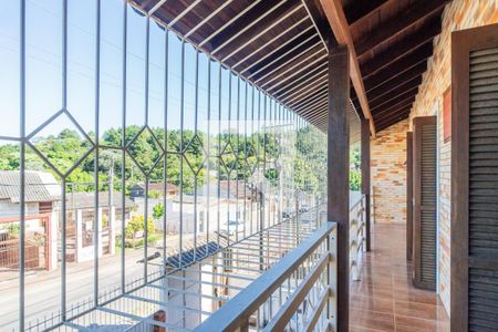 Varanda de casa à venda com 4 quartos, 320m² em Vila Nova, Porto Alegre