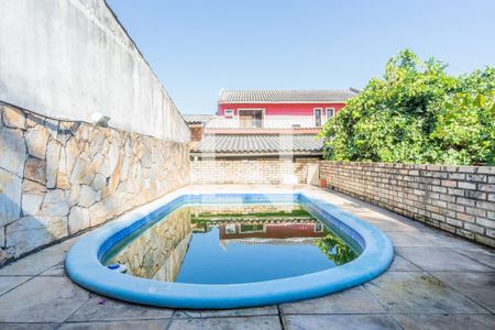 Piscina de casa à venda com 4 quartos, 320m² em Vila Nova, Porto Alegre