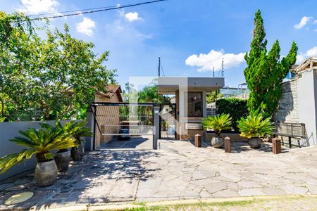 Fachada de casa de condomínio à venda com 3 quartos, 140m² em Aberta dos Morros, Porto Alegre