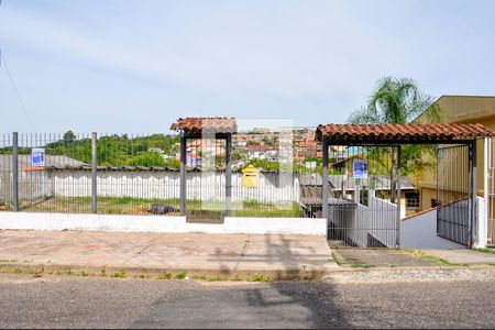Fachada Plaquinha de casa à venda com 4 quartos, 90m² em Vila Nova, Porto Alegre