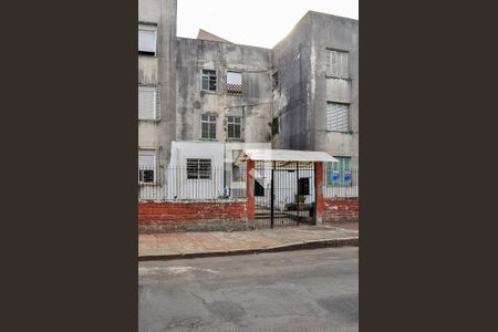 Fachada e placa de apartamento à venda com 2 quartos, 64m² em Cavalhada, Porto Alegre