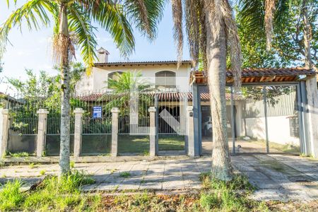 Fachada de casa à venda com 5 quartos, 308m² em Aberta dos Morros, Porto Alegre