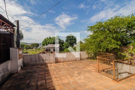 Vista de casa à venda com 4 quartos, 200m² em Medianeira, Porto Alegre