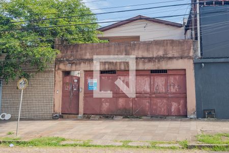 Fachada de casa à venda com 4 quartos, 200m² em Medianeira, Porto Alegre