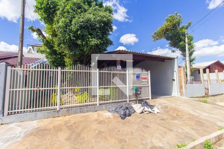 Fachada de casa à venda com 4 quartos, 170m² em Estância Velha, Canoas