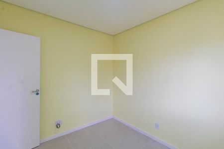 Quarto 1 de casa de condomínio para alugar com 2 quartos, 60m² em Rio Branco, Canoas