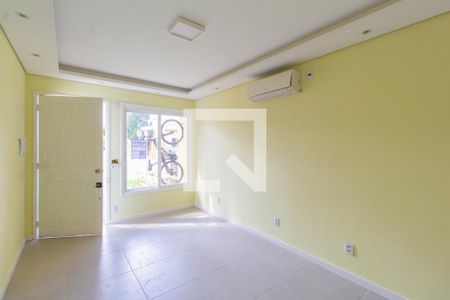 Sala de casa de condomínio para alugar com 2 quartos, 60m² em Rio Branco, Canoas