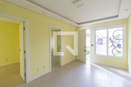 Sala de casa de condomínio para alugar com 2 quartos, 60m² em Rio Branco, Canoas