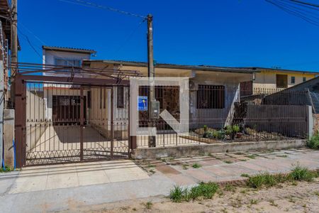 Fachada de casa à venda com 4 quartos, 100m² em Sarandi, Porto Alegre