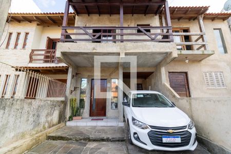 Fachada de casa de condomínio à venda com 3 quartos, 140m² em Espírito Santo, Porto Alegre