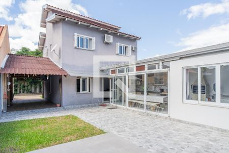 Quintal de casa de condomínio à venda com 3 quartos, 185m² em Aberta dos Morros, Porto Alegre