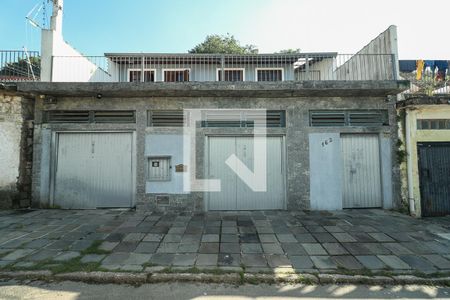 Fachada de casa à venda com 3 quartos, 185m² em Jardim Sabará, Porto Alegre