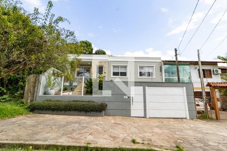 Fachada de casa à venda com 3 quartos, 192m² em Partenon, Porto Alegre