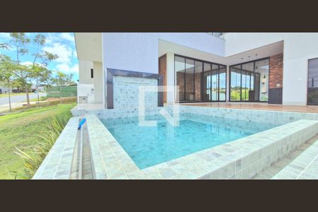 Piscina de casa de condomínio à venda com 4 quartos, 384m² em Alphaville Vespasiano, Vespasiano
