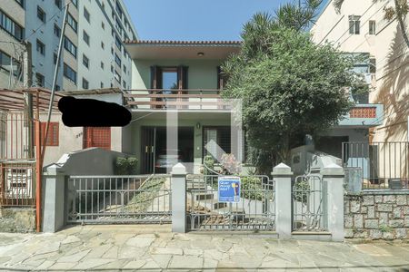 Fachada de casa à venda com 3 quartos, 250m² em Auxiliadora, Porto Alegre