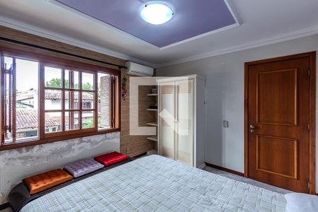 Quarto 2 de casa à venda com 3 quartos, 290m² em Parque Urbano, Porto Alegre