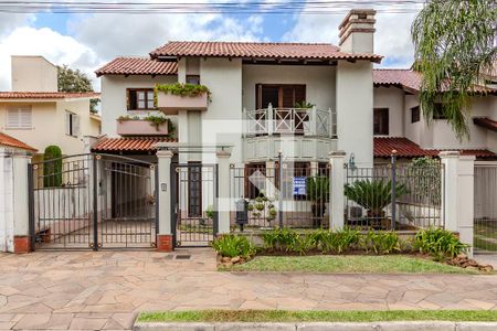 Fachada de casa à venda com 3 quartos, 290m² em Parque Urbano, Porto Alegre