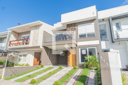 Fachada de casa de condomínio à venda com 3 quartos, 154m² em Aberta dos Morros, Porto Alegre