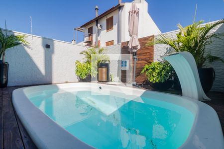 Varanda gourmet de casa à venda com 3 quartos, 160m² em Guarujá, Porto Alegre