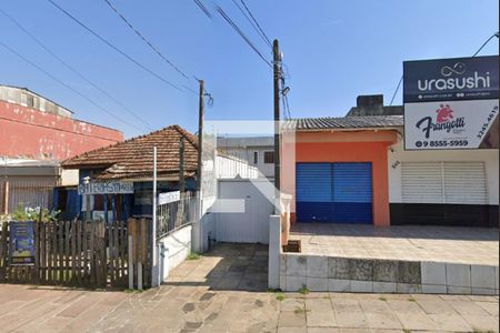 Fachada de casa à venda com 3 quartos, 130m² em Jardim Sabará, Porto Alegre