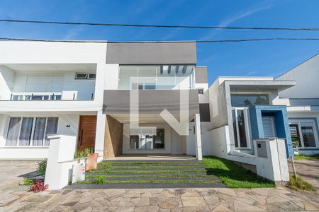 Fachada de casa de condomínio à venda com 3 quartos, 166m² em Aberta dos Morros, Porto Alegre
