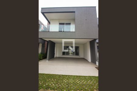 Fachada de casa de condomínio à venda com 3 quartos, 209m² em Ipanema, Porto Alegre