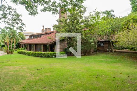 Quintal de casa de condomínio para alugar com 5 quartos, 590m² em Cavalhada, Porto Alegre