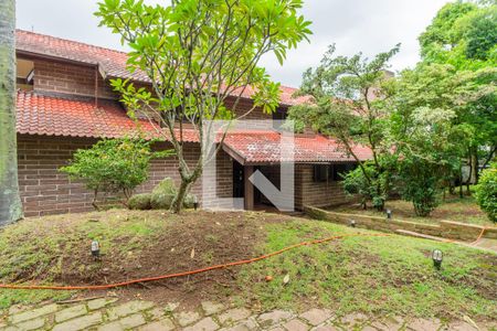 Fachada de casa de condomínio para alugar com 5 quartos, 590m² em Cavalhada, Porto Alegre