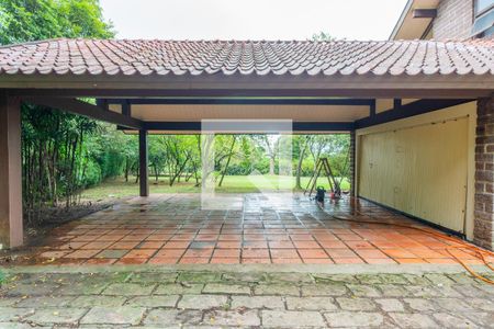 Garagem de casa de condomínio para alugar com 5 quartos, 590m² em Cavalhada, Porto Alegre