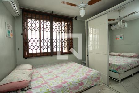 Quarto 1 de casa à venda com 3 quartos, 130m² em Vila Ipiranga, Porto Alegre