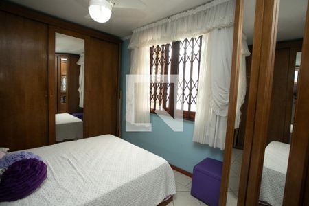 Quarto 2 de casa à venda com 3 quartos, 130m² em Vila Ipiranga, Porto Alegre