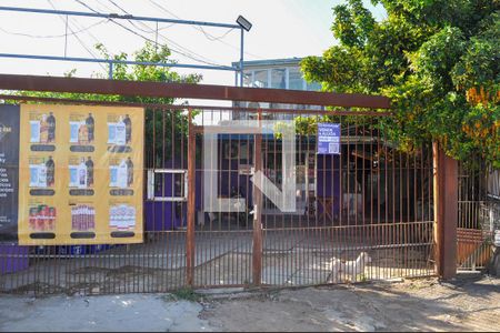 Fachada de casa à venda com 2 quartos, 174m² em Vila Nova, Porto Alegre