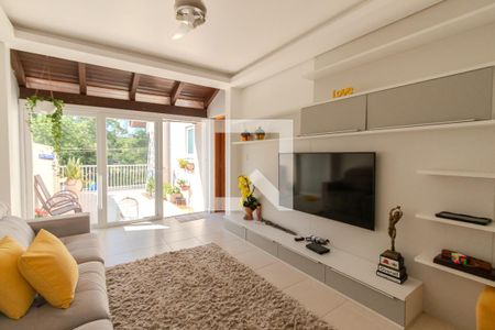 Sala de TV de casa à venda com 4 quartos, 302m² em Parque Urbano, Porto Alegre