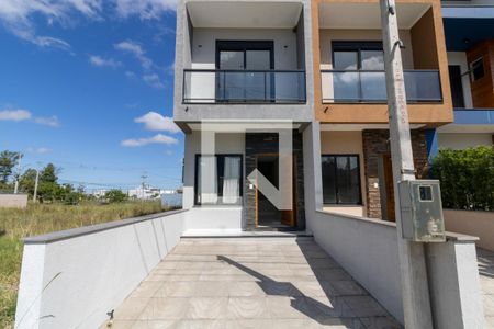 Fachada de casa à venda com 2 quartos, 108m² em Hípica, Porto Alegre